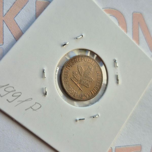 Монета Німеччини 1 пфеніг 1991 року, мітка монетного двору "F" - Штутгарт de_1_1991_F фото