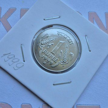 Монета Індії 1 рупія 1999 року, мітка монетного двору: "mk" - Кремніца in_1Р_1999_Кремніца фото