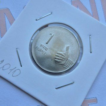 Монета Індії 1 рупія 2010 року, мітка монетного двору: "&diams;" - Мумбаї in_1Р_2010_Мумбаї фото