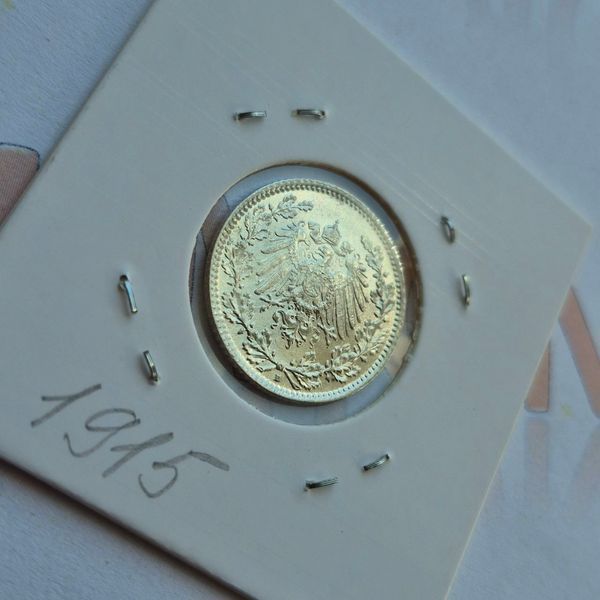 Монета Німеччини &frac12; марки 1915 року, мітка монетного двору "D" - Мюнхен de_1/2DM_1915_D фото