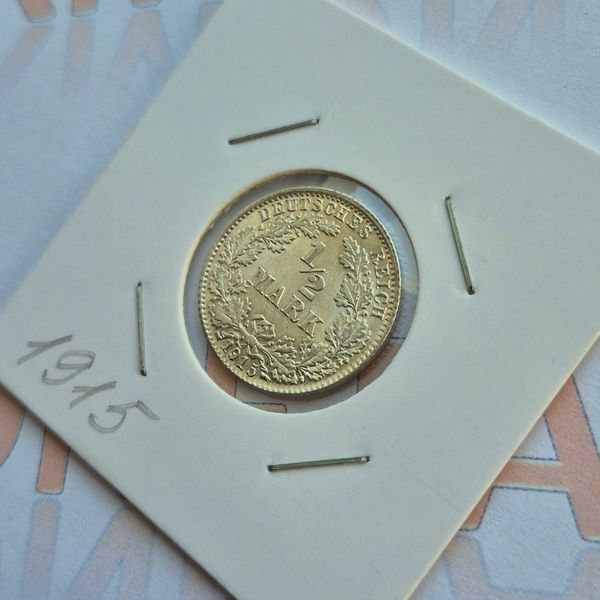 Монета Німеччини &frac12; марки 1915 року, мітка монетного двору "D" - Мюнхен de_1/2DM_1915_D фото