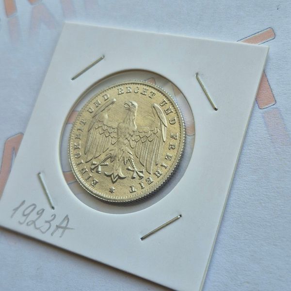 Монета Німеччини 500 марок 1923 року, мітка монетного двору "A" - Берлін de_500DM_1923_A фото